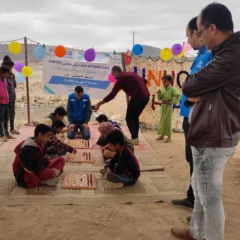 A UNHCR team visits the community center and child friendly space