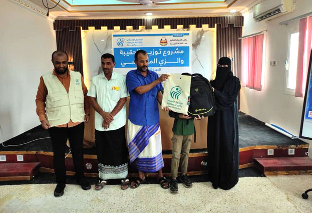  delivers school uniforms and bags to orphans