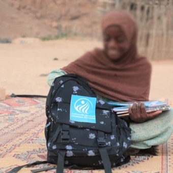 HUMAN ACCESS distributes 3,440 school bags and uniforms