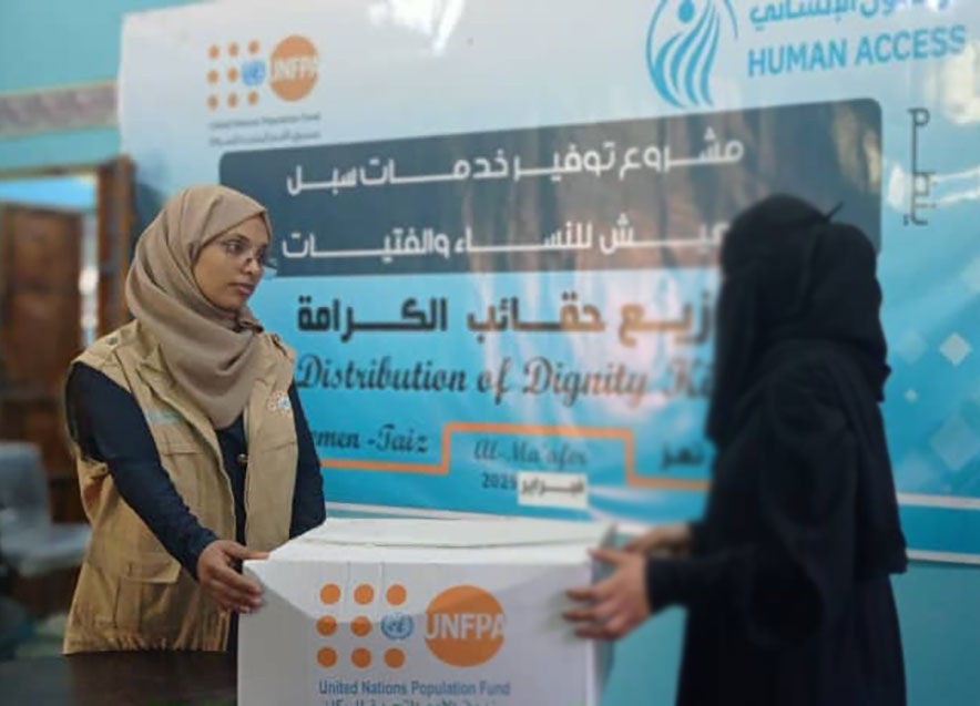 Distributing dignity kits in Taiz and organizing a bazaar in Marib